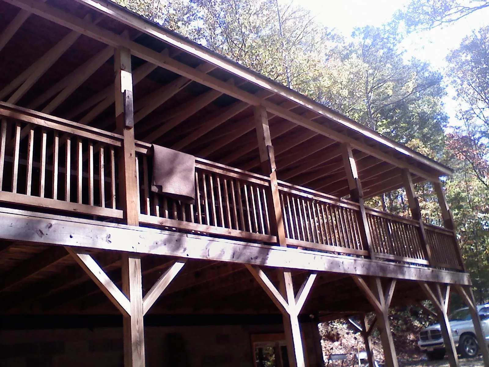 Timber framing under a new elevated porch and deck — Roof Leak Repair in Steens by Roofing Brothers